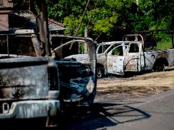 Ayer fueron emboscados y ejecutados a balazos 14 policías estatales en Michoacán. AFP/E. Castro
