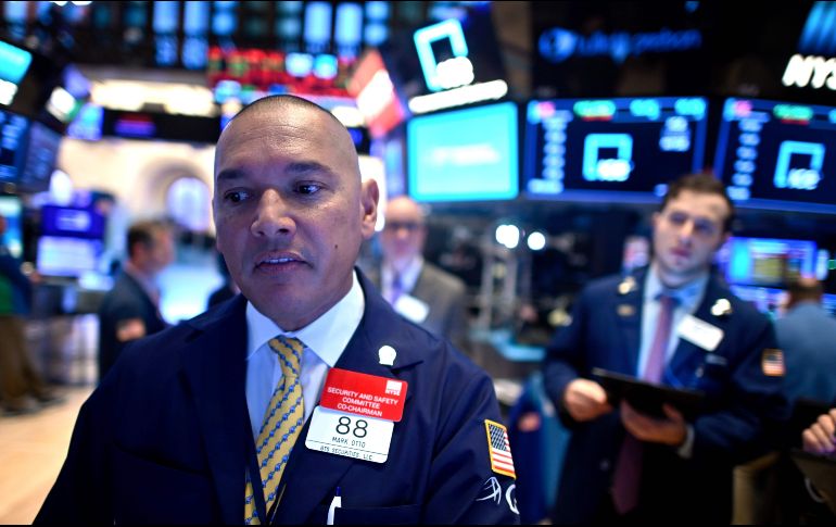 El NYSE Composite sube 50.10 puntos al operar en 12 mil 946.32 unidades.  AFP / J. Eisele