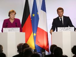 Angela Merkel y Emmanuel Macron ofrecen una rueda de prensa conjunta en Toulouse. AP/F. Scheiber