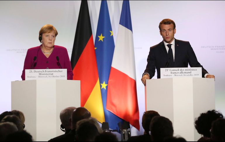 Angela Merkel y Emmanuel Macron ofrecen una rueda de prensa conjunta en Toulouse. AP/F. Scheiber