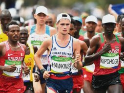 Eliud Kipchoge. El keniano (derecha) es uno de los favoritos para ganar el oro. AFP