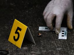 Investigadores y peritos trabajaron en el acopio de indicios en la zona del ataque. NTX/ARCHIVO