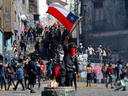 Los destrozos por las movilizaciones y los saqueos de los últimos días son abundantes y están por todas partes. AFP / J. Torres