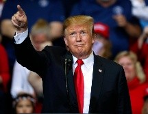Trump jugó beisbol en la escuela secundaria en la Academia Militar de Nueva York y ha realizado el primer lanzamiento ceremonial en varios juegos de Grandes Ligas. AP / ARCHIVO