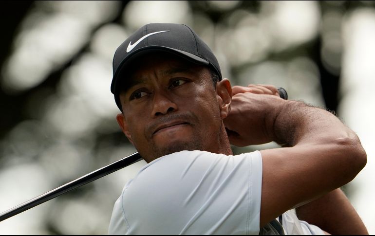 Tiger Woods continuó con el buen juego a pesar del día de descanso y se encuentra por segundo día consecutivo en lo más alto del tablero. AP / L. Jin-man