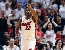 Butler aportó 21 puntos en su primer juego con el uniforme del Heat de Miami. AP / L. Sladky