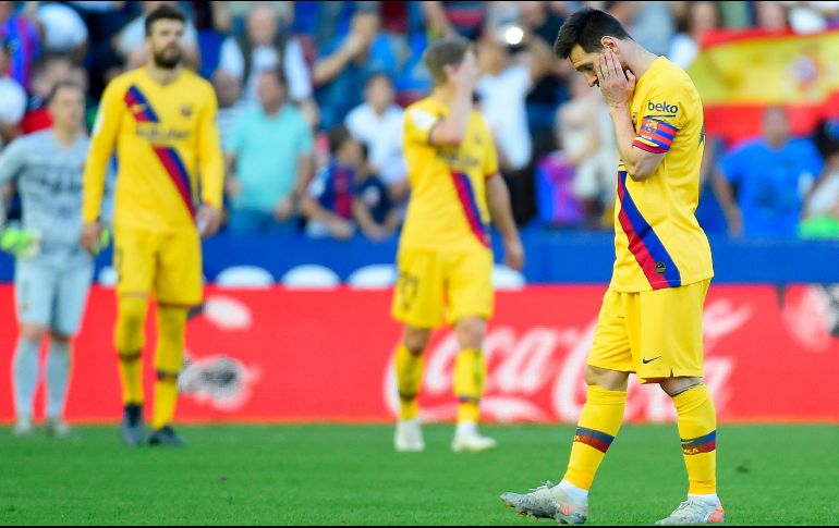 Lionel Messi abrió el marcador de penal al '37, pero el Levante remontó en ocho minutos de locura, con tantos de José Campaña, Borja Mayoral y del serbio Nemanja Radoja. AFP / J. Jordan