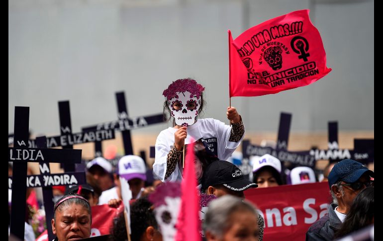 Participantes en la manifestación en Ciudad de México. AFP/P. Pardo