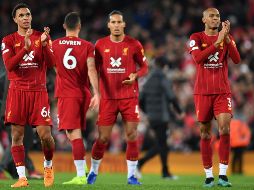 La carga de partidos obligará al conjunto de Jürgen Klopp a utilizar dos equipos diferentes para las dos competiciones, según anunciaron en un comunicado. AFP / ARCHIVO