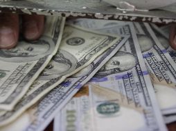 La divisa se adquirió en un mínimo de 17.95 pesos en sucursales bancarias capitalinas. EL INFORMADOR/ARCHIVO