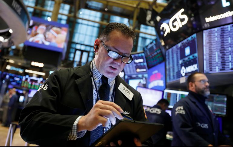 El índice Dow Jones reporta este miércoles una baja de 46.75 puntos. AP / R. Drew