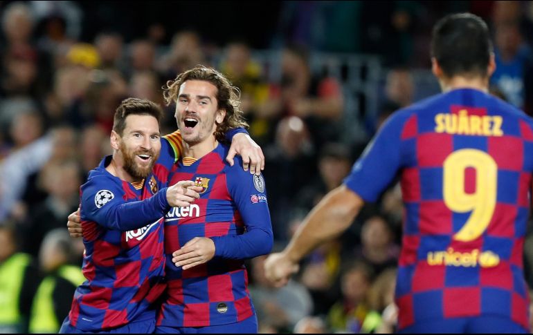 Messi no pudo celebrar de mejor manera su partido 700 con el Barcelona. AP / J. Monfort