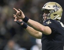 Drew Brees ha comandado al equipo de los Saints a ganar dos títulos divisionales consecutivos y hoy podría concretar un tercer cetro de su zona. AFP / C. Graythen