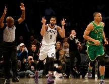 Spencer Dinwiddie se destapó ayer con 32 puntos. AP/A. Hunger
