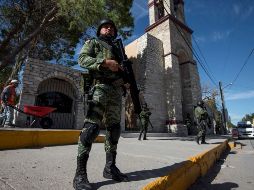 Agentes de la Guardia Nacional realizan labores de vigilancia en la población de Villa Unión, en el estado de Coahuila, luego de un ataque armado el pasado sábado. EFE/M. Sierra