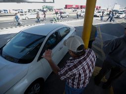 El estacionamiento del Aeropuerto está tomado por los ejidatarios desde mediados de noviembre en reclamo por la falta de pago de las 306 hectáreas en donde se construyó el inmueble. EL INFORMADOR/ ARCHIVO