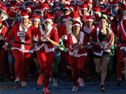Fotogalería: Santas inundan el Parque Metropolitano