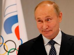Putin dijo que especialistas rusos deben evaluar con detalle la condena que excluye a Rusia de toda competencia internacional por cuatro años. AFP/S. Zhumatov