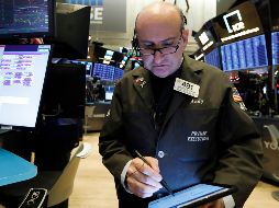 Este miércoles, el índice industrial Dow Jones ganó 0.11% a 27 mil 911.30 puntos. AP/R. Drew