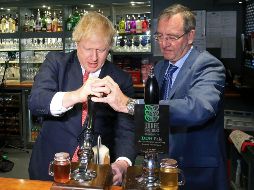 BREXIT. Johnson (izq.) tendrá mayoría para materializar la salida de su país de la Unión Europea. AFP