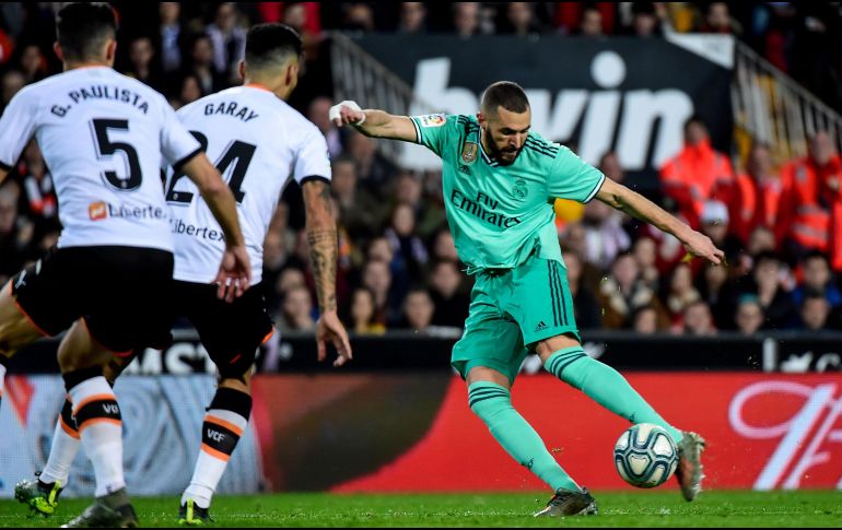 Karim Benzema consiguió el gol del empate en los últimos instantes de un reñido encuentro. AFP/J. Jordán