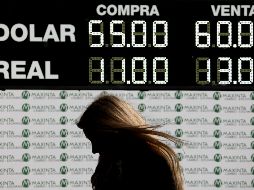 Una gran mayoría de los argentinos tiene sus ahorros en dólares y gran parte de ellos se encuentra en el exterior. AP/N. Pisarenko