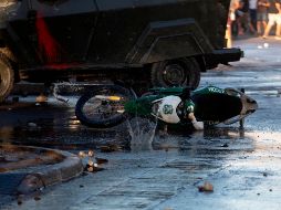 El violento incidente acrecienta las críticas hacia el cuerpo de Carabineros, en la mira de diversas organizaciones internacionales por su actuar violento. AFP/C. Reyes