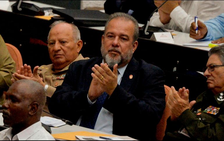 Manuel Marrero Cruz (c) en la reunión del cuarto periodo ordinario de sesiones de la IX Legislatura de la Asamblea Nacional, en La Habana. AFP/Y. Lage