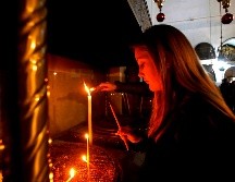 Las festividades navideñas se viven en un ambiente de tranquilidad y animación, con turistas que vienen de diversas partes del mundo. AFP/M. Al Shaer
