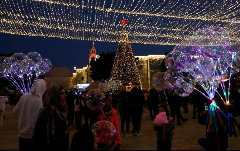 Las festividades navideñas se viven en un ambiente de tranquilidad y animación, con turistas que vienen de diversas partes del mundo. AFP/H. Bader