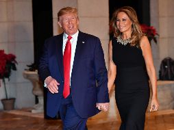 Trump y Melania pasan las fiestas en el club privado del presidente en Palm Beach.  AFP / N. Kamm