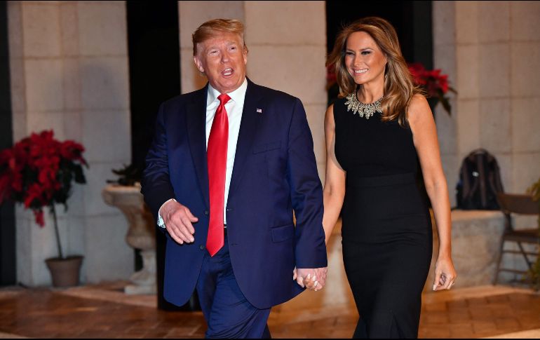 Trump y Melania pasan las fiestas en el club privado del presidente en Palm Beach.  AFP / N. Kamm