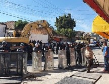 En redes sociales surgieron videos donde se muestra en enfrentamiento que se dio entre los antimotines y pobladores de Puente Grande. EL INFORMADOR