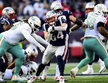 Es la segunda temporada consecutiva que los Dolphins evitan que los Patriots terminen invictos ante sus adversarios de división. AFP / B. Weiss