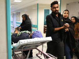 El presidente iraní Hassan Rouhani lamentó también la muerte de varios compatriotas en el funeral y ordenó tanto al vicepresidente como al ministro de salud, ocuparse de los heridos y familias afectadas. AFP / A. Kenare