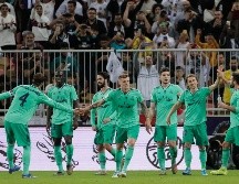 Luka Modric (2d) celebra con sus compañeros luego de anotar al minuto 65 del partido. AP/A. Nabil