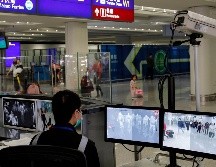 En el aeropuerto de Hong Kong, las autoridades reforzaron el control de pasajeros que llegan de China continental. AP/ARCHIVO