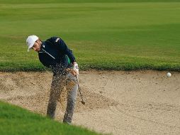 Sony open. Abraham realiza un tiro para salir de una trampa de arena en el hoyo 16. AP