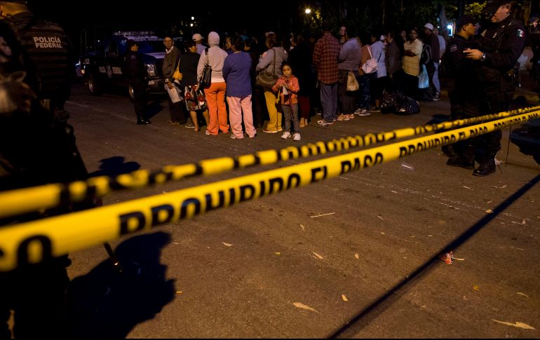 Además de los decesos, reportan a una menor de edad lesionada por un impacto de arma de fuego. AP/ARCHIVO