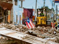 De forma extraoficial se calcula que hay daños en tres mil viviendas desalojadas por colapso o riesgo de derrumbe. AFP