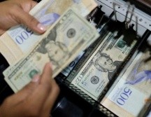 Los expertos creen que ya hay más dólares que bolívares en el país. GETTY IMAGES