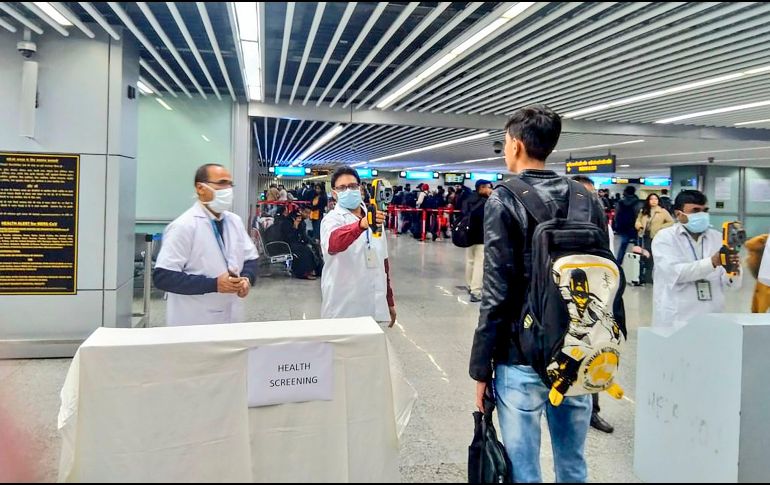 Varios aeropuertos han comenzado a inspeccionar a los pasajeros de vuelos provenientes de Wuhan. AFP/Ministry of Civil Aviation
