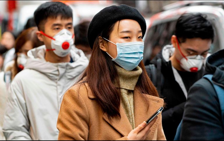 Las autoridades han confirmado cinco casos de la infección por el coronavirus en Hong Kong. Todos los pacientes habían estado en Wuhan. AFP / N. Halle'n