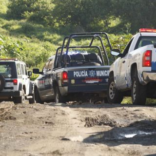 Encuentran a un joven muerto dentro de un carro en Tlajomulco