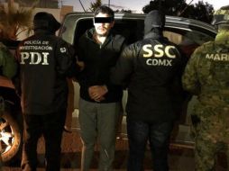 Imagen cedida por la Secretaría de Seguridad Ciudadana (SSC) que muestra la detención de Óscar Andrés Flores (c), alias 