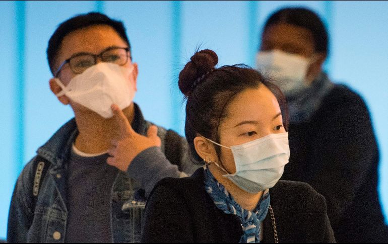 La propagación de la epidemia ya se tornó una emergencia internacional, y varios países cancelaron sus vuelos hacia y desde China. AFP/M. Ralston