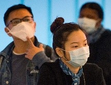 La propagación de la epidemia ya se tornó una emergencia internacional, y varios países cancelaron sus vuelos hacia y desde China. AFP/M. Ralston