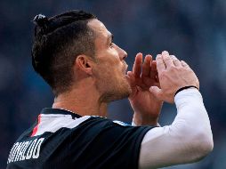 Ronaldo anotó un doblete de penal en el minuto 40 y 80. AFP / M. Bertorello