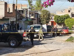 El lugar estaba resguardado por elementos de la Guardia Nacional mientras policías estatales reunían información. EL INFORMADOR /