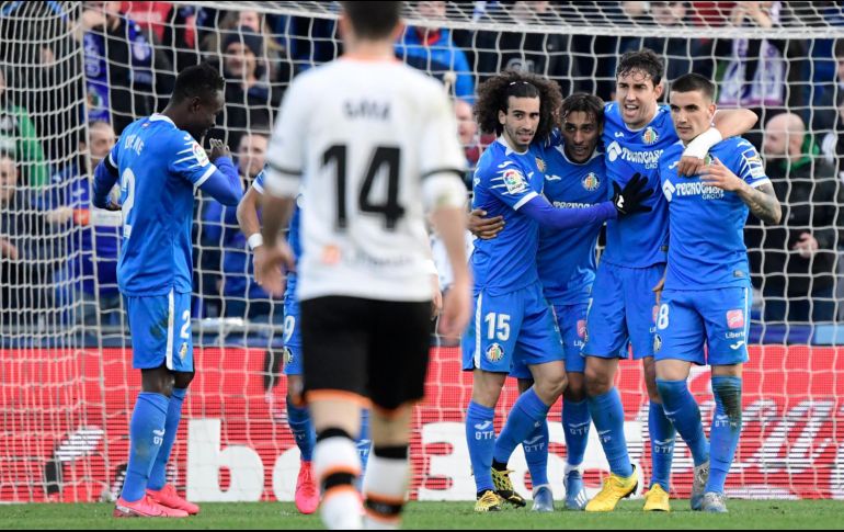 Con este triunfo, Getafe llegó a 42 unidades y continúa soñando con dar la sorpresa en el torneo español. AFP / J. Soriano